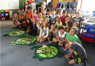 The students showing off their great sea turtle work
